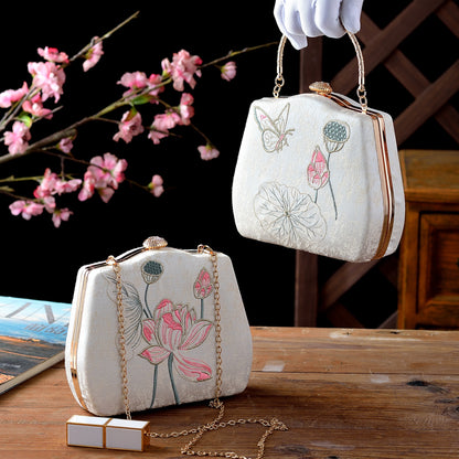 Ivory Embroidered Lotus & Butterfly Handbag – Elegance Woven in Tradition