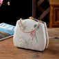 Ivory Embroidered Lotus & Butterfly Handbag – Elegance Woven in Tradition