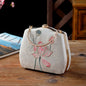 Ivory Embroidered Lotus & Butterfly Handbag – Elegance Woven in Tradition