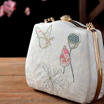 Ivory Embroidered Lotus & Butterfly Handbag – Elegance Woven in Tradition